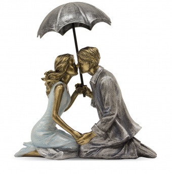 Figurine of a couple with an umbrella